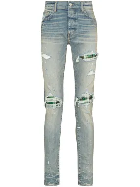 Amiri Distressed Ripped-Finish Skinny Jeans for Men - Fashionable Slim Fit with Premium Denim Quality