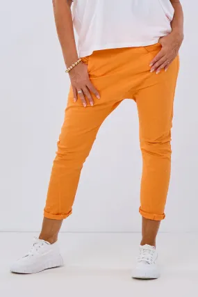 Baggy Jeans mit schrägem Reißverschluss, orange