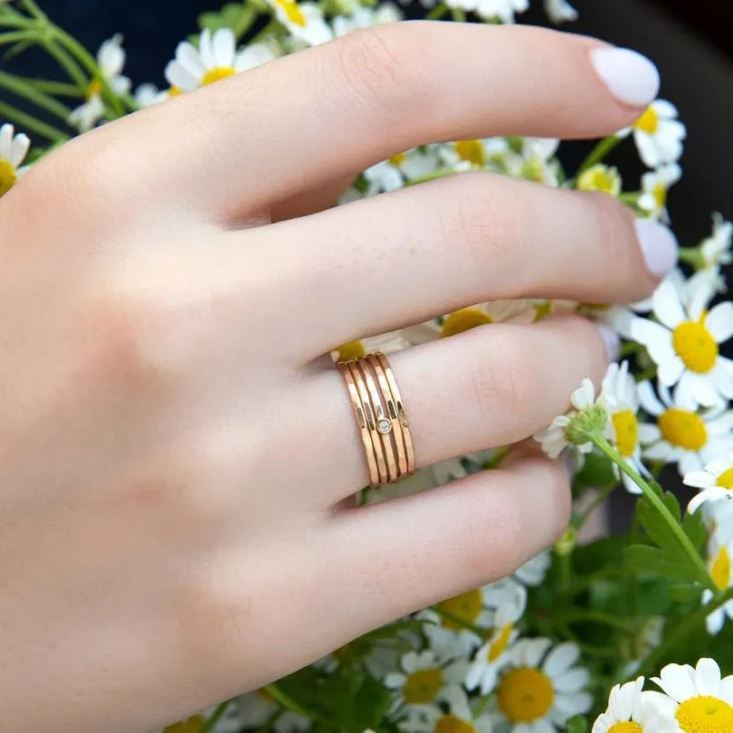 Five Gold Thin Hammered Stacking Rings with Single Diamond